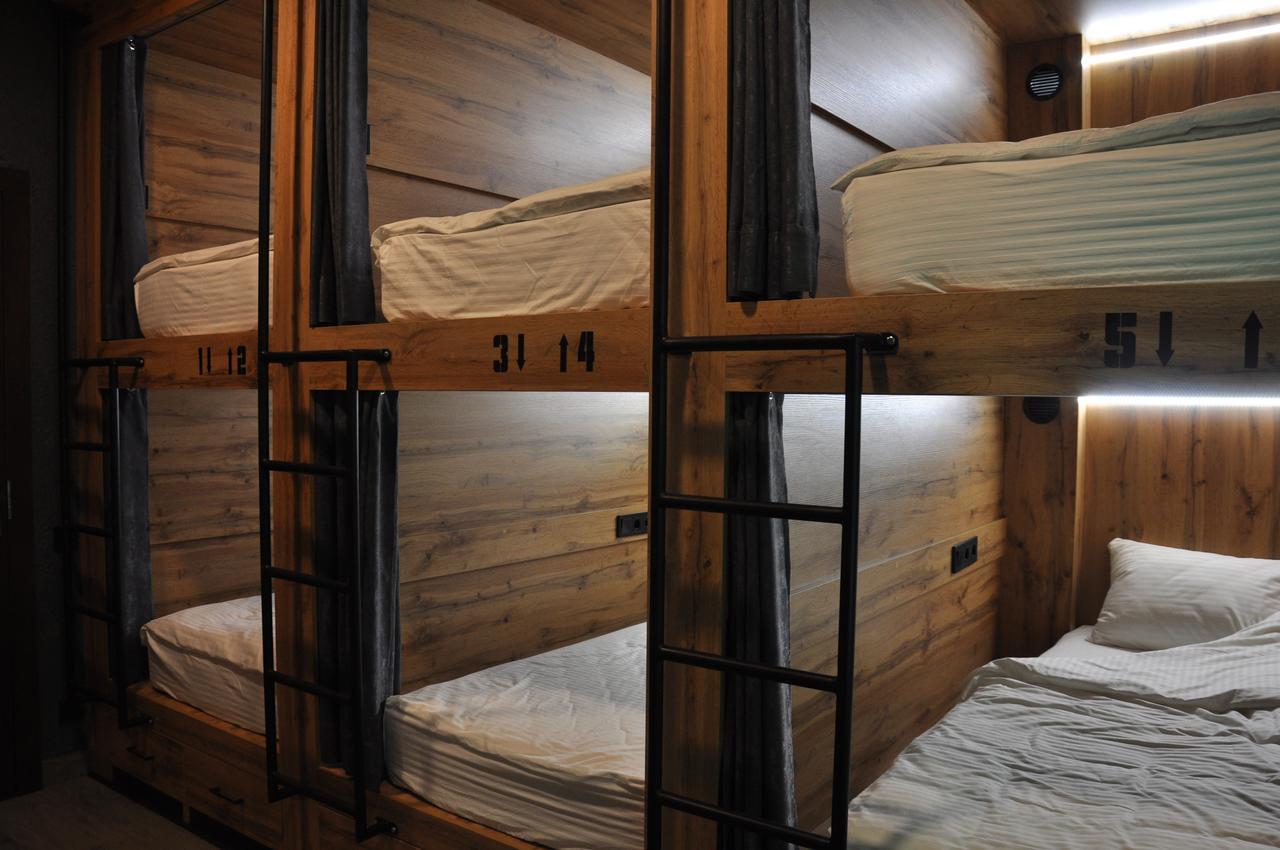 Full House Capsule Hostel Rivne Exterior photo Beds in a capsule hotel