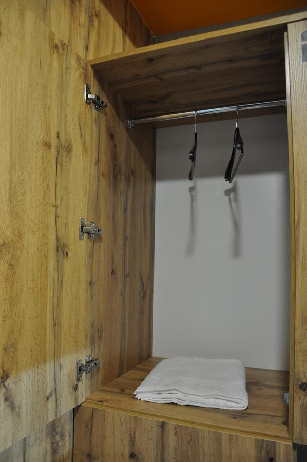 Full House Capsule Hostel Rivne Exterior photo A pair of compasses