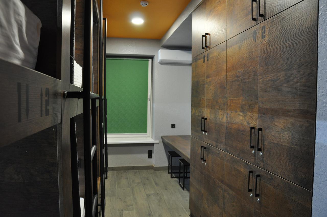 Full House Capsule Hostel Rivne Exterior photo A typical student bedroom